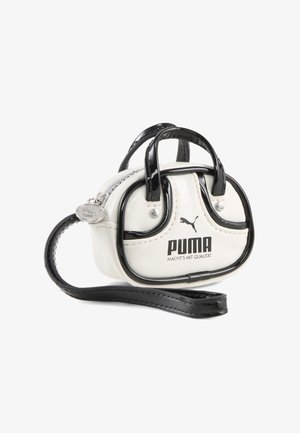 Pequeño bolso de muñeca Puma blanco y negro con dos asas, cierre de cremallera y correa de muñeca desmontable con tirador de cremallera con marca.