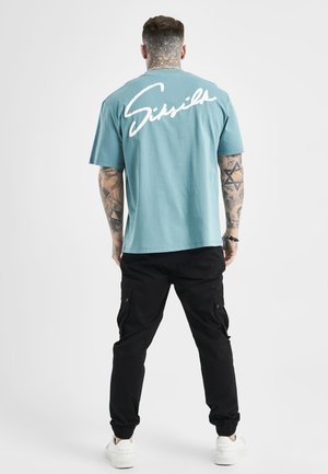 SCRIPT EMBROIDERY - Triko s potiskem - teal