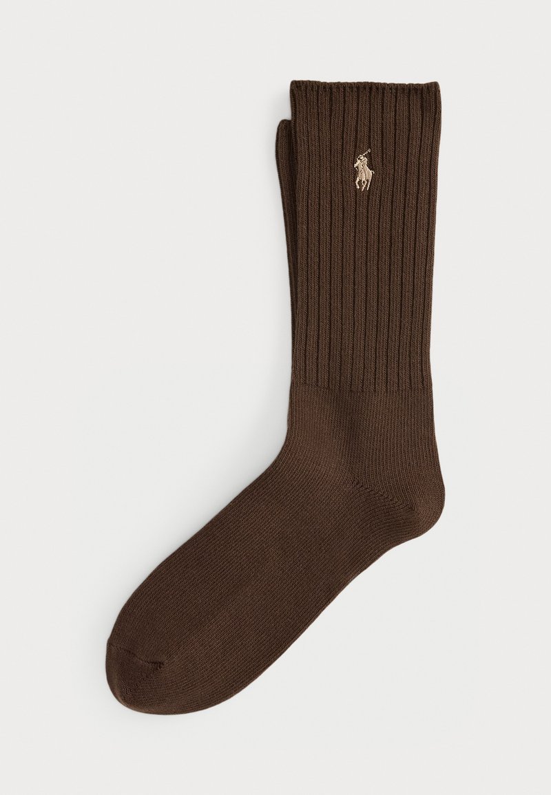 Barna bordázott rövidszárú zokni bézs hímzett ló és lovas logóval a vádliján, fehér háttéren elhelyezve.