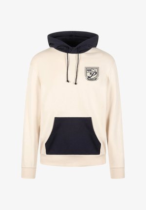 Felpa con cappuccio beige con cappuccio nero, tasca frontale nera, coulisse nere e un piccolo emblema sul petto sinistro con "48" e una "P" stilizzata.