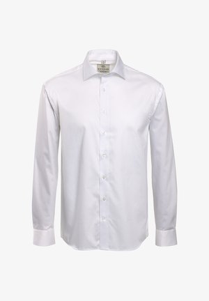 Witte langwerpige blouse gemaakt van katoen. Heeft een puntkraag, een knoopsluiting aan de voorkant en een textuur zonder zichtbare patronen.