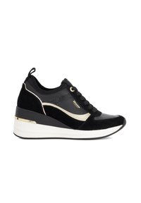 Black wedge sneaker with gold accents, lace-up front, white sole, and pull tab on the heel, viewed from the side.