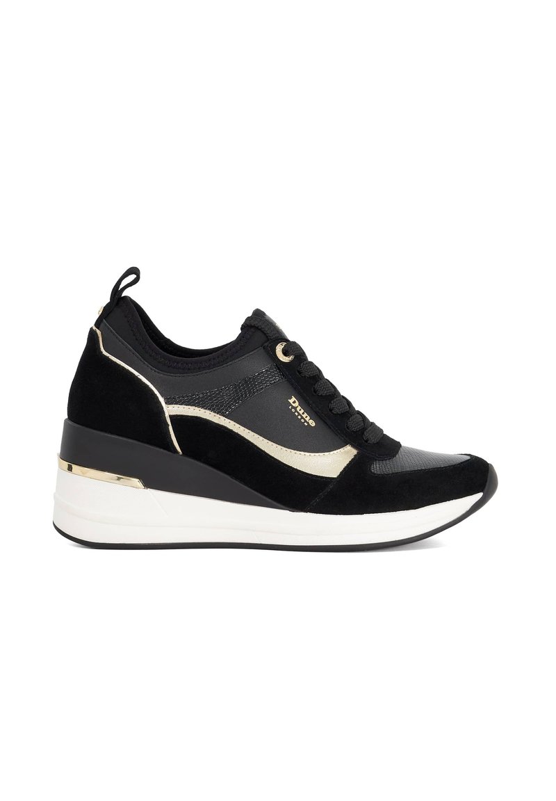 Black wedge sneaker with gold accents, lace-up front, white sole, and pull tab on the heel, viewed from the side.