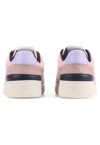 Pink suede sneakers with a navy leather accent, pale purple heel tabs, and cream rubber soles. GAP logo embossed on the heel.