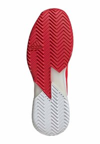 Adidasova potplat cipela s crvenim, bijelim i teksturiranim gumiranim dizajnom, sa cik-cak uzorkom i utisnutim logotipom sa strane.