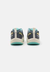Lightweight running shoes in dark gray and mint green. Features include a textured mesh upper, cushioned sole, and pull tab for easy wear.