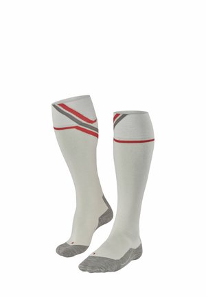 Kniestrümpfe mit Kompression in Weiß mit grauen und roten diagonalen Streifen. Verfügen über verstärkte Zehen- und Fersenbereiche mit gepolstertem Texturelement.