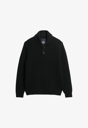 Zwart trui met een sjawlboord, geribbelde textuur, sluiting met twee knopen en diagonale breipatronen aan de zijkanten.
