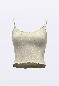 Šviesiai žalia ribuota cami palaidinė su subtiliu baltu gėlių raštu, kraštas su bangelėmis ir plonos reguliuojamos petnešėlės. Minkšta audinio tekstūra.