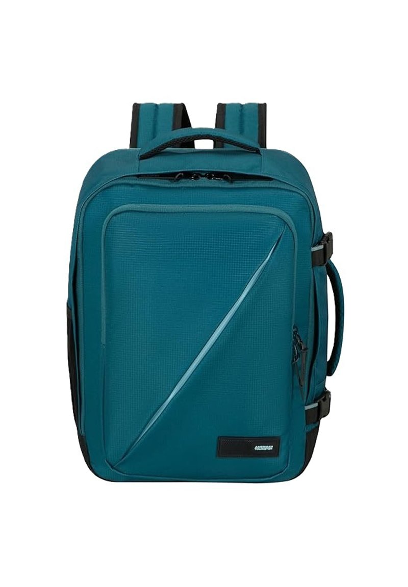 Zaino rettangolare turchese con spallacci imbottiti, tasca frontale con zip, manico laterale e dettaglio a taglio diagonale.