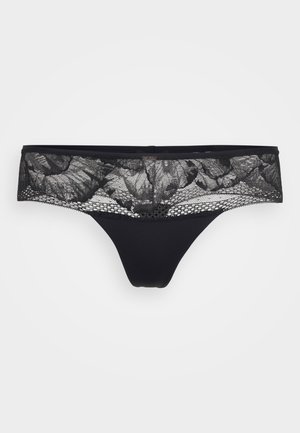 Black thong underwear featuring a floral lace waistband and smooth fabric. The design includes a delicate mesh pattern and seamless edges.