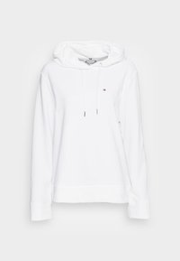 Biała bluza z kapturem, wykonana z miękkiego materiału, z regulowanym kapturem, ściągaczami na mankietach, prostym dołem oraz małym logo na lewej piersi.
