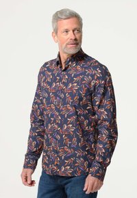 Lange mouwen knoopshirt met een marineblauwe achtergrond, voorzien van oranje en paarse bladerenpatronen. Gemaakt van een soepele stof met een relaxte pasvorm.