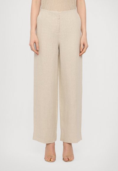 Beige, wide-leg trousers in a textured linen blend with a front zipper closure. Casual design with an unhemmed finish at the ankles.