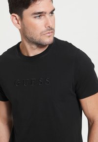 Guess - T-shirt z nadrukiem