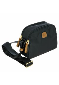 Borsa a tracolla nera in nylon con due cerniere, dettagli in pelle beige e hardware dorato. Caratterizzata da una tracolla regolabile e forma rettangolare.