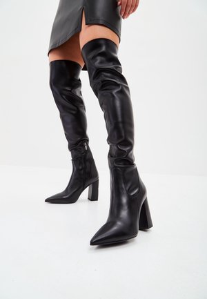 High heeled boots - black