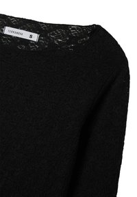 Top in pizzo nero con scollo rotondo, caratterizzato da motivi floreali e maniche lunghe. Etichetta visibile con la scritta "Terranova" taglia S.