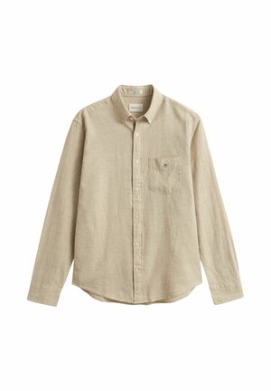 Chemise beige à manches longues avec boutons, col et poche poitrine, en tissu texturé, posée à plat sur un fond blanc.