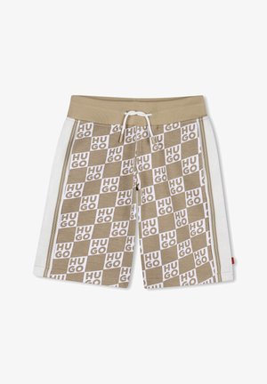 Shorts beige et blancs à cordon de serrage avec un motif à carreaux de logos "HUGO" et des panneaux latéraux blancs avec des bandes beiges.