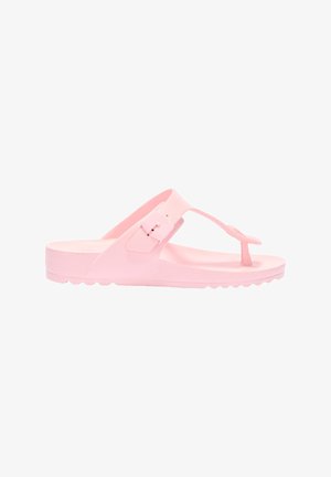 Light pink rubber thong sandal with adjustable strap and textured sole, designed for casual wear.