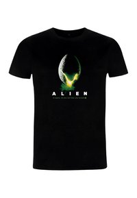 Czarny t-shirt z krótkim rękawem z grafiką zielonego kosmicznego jaja obcego i napisem poniżej: „OBCY w kosmosie, nikt nie usłyszy twojego krzyku.”