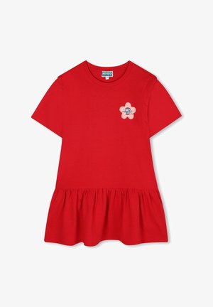 Czerwona bawełniana koszulka z krótkim rękawem, z rozkloszowanym dołem i różowym logo w kształcie kwiatu z napisem "KENZO PARIS" na piersiach.