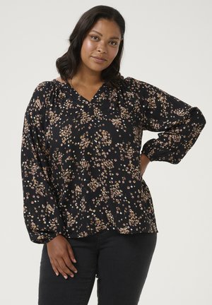 Blusa nera con un motivo floreale in tonalità di rosa e bianco. Presenta un collo a V, maniche lunghe a sbuffo e una vestibilità ampia. Tessuto morbido.