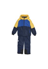 Tvådelad vinteroutfit med en marinblå och gul design. Jackan har huva och fickor med dragkedja; byxorna har svarta detaljer och en vit logotyp.