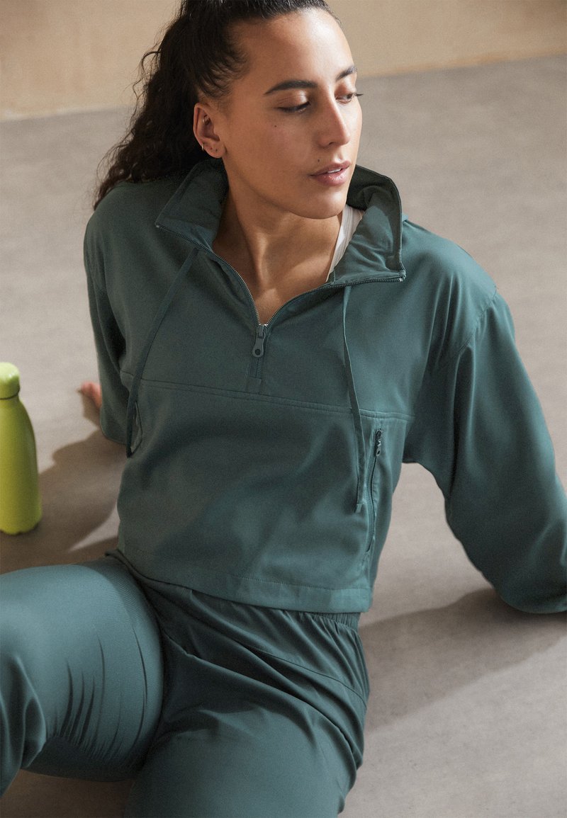 Girlfriend Collective HUMMINGBIRD HALF ZIP - Vindjacka - moss