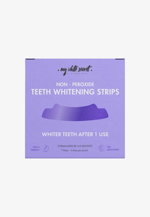 Boîte de bandes éclaircissantes pour dents sans peroxyde, violette, promet des dents plus blanches dès une seule utilisation, adaptée aux vegans, sans sensibilité, formulée par des dentistes britanniques.