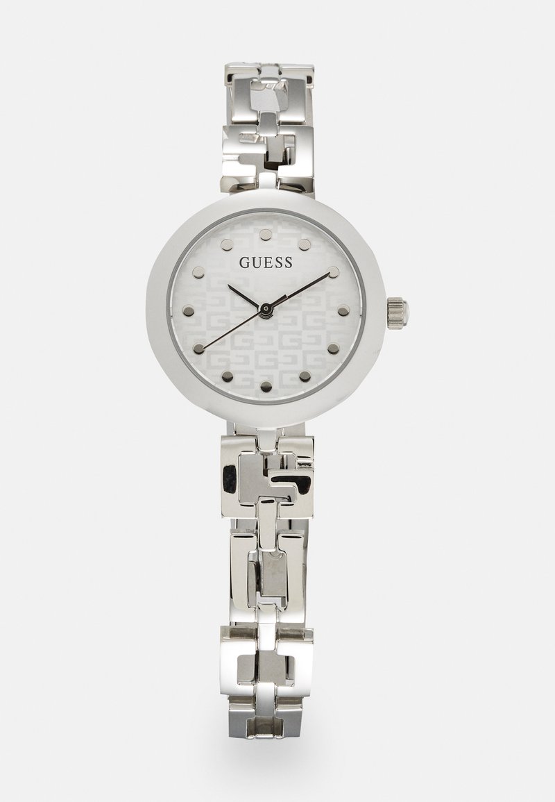 Zilveren roestvrijstalen horloge met een ronde wijzerplaat, witte patroon dial en stud markers. Heeft een schakelschakelarmband ontwerp.