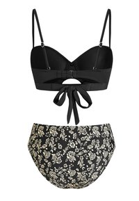 Schwarzes Bikini-Oberteil mit verstellbaren Trägern, strukturiertem Stoff und Bindeband hinten. Passender hochgeschnittener Bikini-Unterteil mit einem weißen Blumenmuster auf schwarzem Hintergrund.