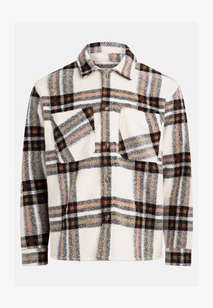 Flannel shirt in white with a plaid pattern featuring black, orange, and brown lines. Button-up front with two chest pockets. Soft texture.