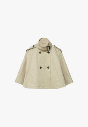 Béžový krátky trenčkot s dvojradovým zapínaním na čierne gombíky, vysokým golierom s prackou, nášivkami na ramenách a dvoma bočnými vreckami.