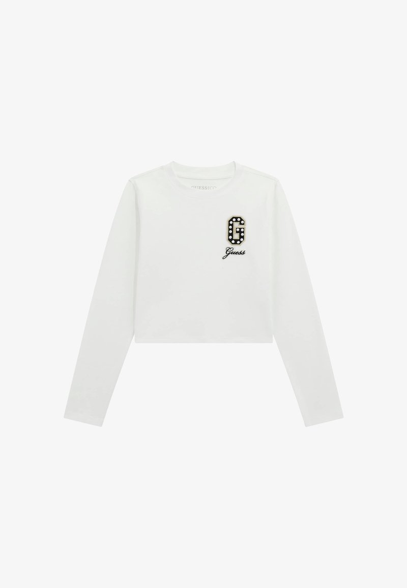 Witte lange mouwen cropped t-shirt met een zwart-wit versierd logo "G" en "Guess" in een sierlijk lettertype onder het logo. Glad van stof.