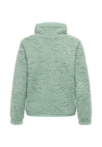 Polarowy jesion w miętowym zielonym kolorze, z wysokim kołnierzem i teksturowanym kwiatowym wzorem. Długie rękawy z elastycznymi mankietami. Miękki, przytulny materiał.