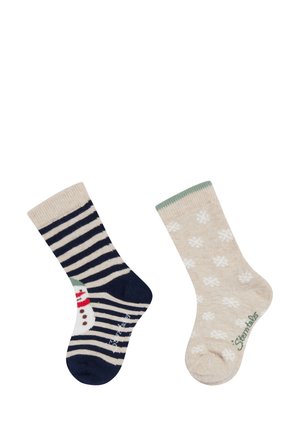 Zwei Kindersocken: eine marineblaue und beige gestreifte mit einem Schneemann, die andere beige mit weißen Schneeflocken und grünem Rand.