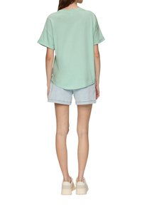 QS T-shirt print - ozeangrün