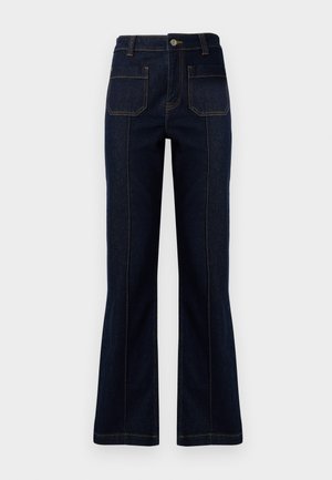 Dark blue flared jeans made of denim, featuring a high waist, two back pockets, and visible stitching along the seams.