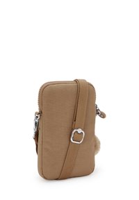 Piccola borsa a tracolla rettangolare di colore beige con tracolla regolabile, chiusura con zip e hardware metallico visibile su sfondo bianco.
