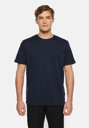 Navy blue cotton T-shirt with short sleeves and a crew neckline. Features a small, subtle logo on the chest. Simple, unembellished design.