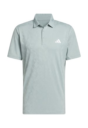 Polo Adidas grigio chiaro con motivo geometrico sottile e apertura a tre bottoni, con logo Adidas bianco sul petto.