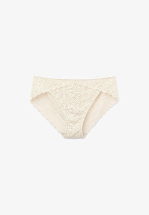 Spetsbikini i ljusbeige med en scalloped kant och blomstermönster över hela. Mjuk textur med intrikata detaljer.