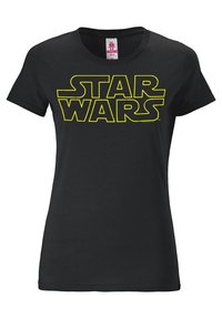 Black cotton t-shirt featuring large yellow text that reads "STAR WARS." Crew neck, short sleeves, smooth texture.