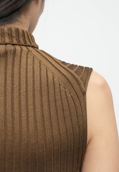 Brown ribbed knit garment with a high neckline, featuring a textured pattern and visible shoulder seams, showcasing a fitted design.