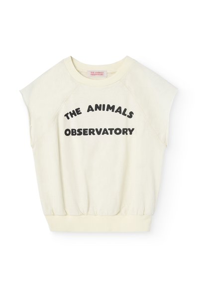 Sudadera de manga corta, amarilla pálido con mangas raglán, con el fondo elástico, que presenta un texto en negro audaz: "THE ANIMALS OBSERVATORY."
