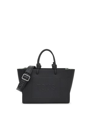 Sac fourre-tout noir avec logo "TOUS" en relief. Il dispose de double anses, d'une bandoulière réglable, d'une forme structurée et d'un matériau texturé.