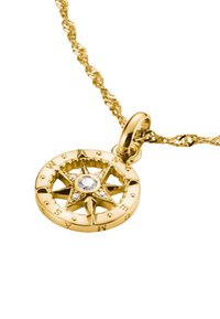 Goldener Kompass-Anhänger mit einem Sternmotiv, zentralem Edelstein und eingravierten Himmelsrichtungen am Rand. Texturiertes Kettchen inklusive.