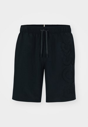 Juodos medvilninės šortai su elastinga juosmena ir raišteliu. Kairėje kojoje didelis toninis "BOSS" logotipas. Lygus paviršius.